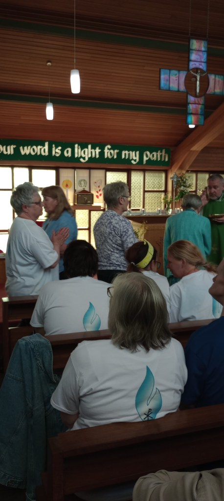 This image has an empty alt attribute; its file name is 12-communion-1.jpg